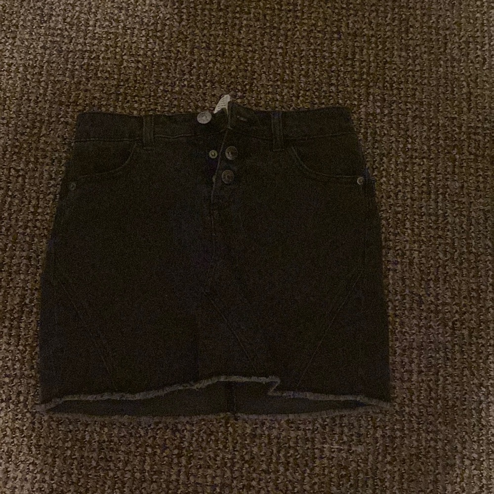 Black jeans skirt size 12 but runs bigger then that